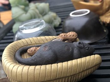 Close-up of drink in basket on table