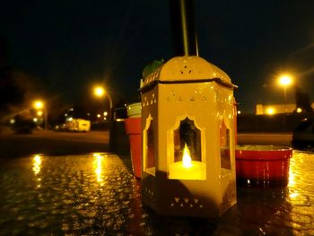 Illuminated street light at night