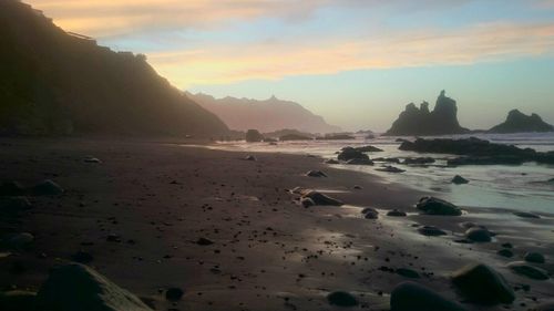 Scenic view of beach against sky