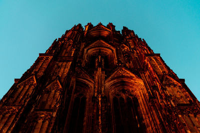 Low angle view of cologne cathedral against clear sky