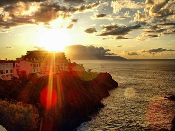 Scenic view of sea at sunset