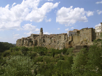 San gimignano is located on top of a hill