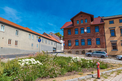 Buildings in city against sky