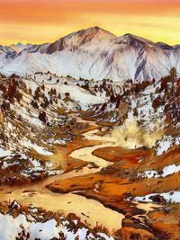 View of snow covered mountain during sunset