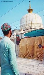 Rear view of man at temple