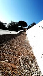 View of stone wall against clear sky