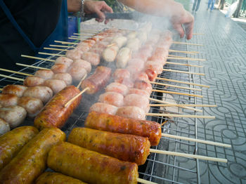 Close-up of meat on barbecue grill