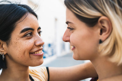 Side view of lesbian couple looking at each other