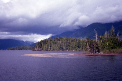 Scenic view of mountains against cloudy sky