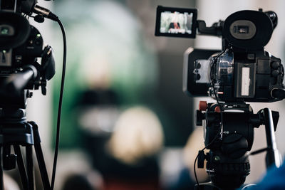 Cameras at a live media conference.