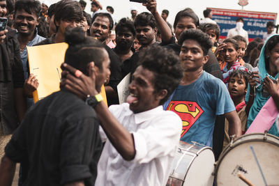 Group of people looking at music concert