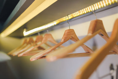 Close-up of clothespins hanging on clothesline