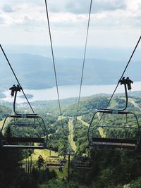 High angle view of ski lift against mountains
