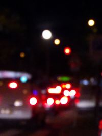 Defocused image of illuminated car