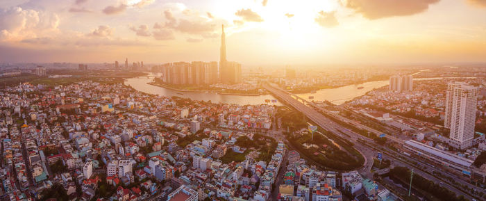 High angle view of city against sky during sunset