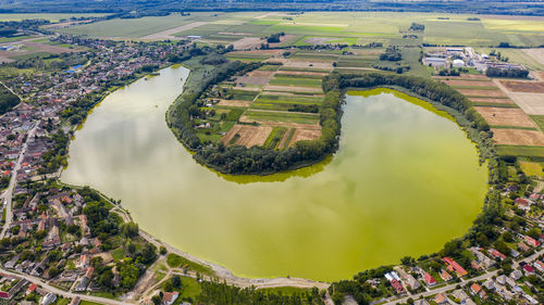 High angle view of river amidst field