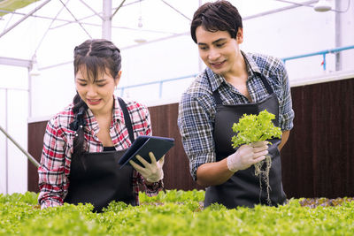 Young couple looking at camera