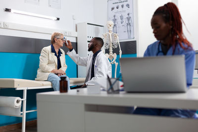 Female doctor working at clinic