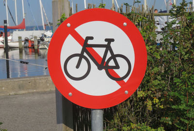 Close-up of  sign on road