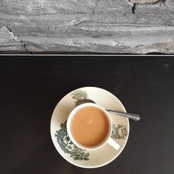 Coffee cup on table