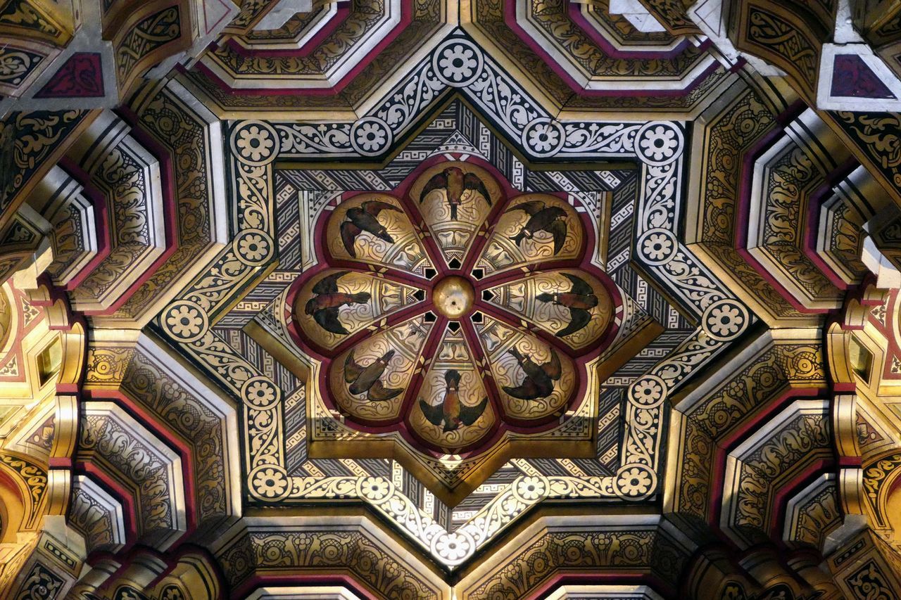 pattern, ceiling, architecture, full frame, no people, art, built structure, indoors, backgrounds, creativity, religion, ornate, shape, craft, low angle view, building, place of worship, directly below, belief, travel destinations, ancient history, geometric shape, flooring, decoration, architectural feature, multi colored