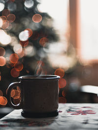 Close-up of coffee cup on table