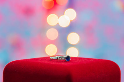 Close-up of illuminated christmas lights on table