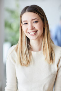 Portrait of smiling young woman