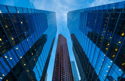 Low angle view of modern buildings against sky