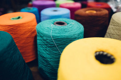 High angle view of colorful spools