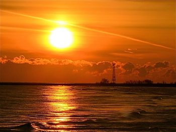 Scenic view of sea at sunset