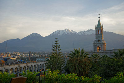 High angle view of a building with mountain range in background