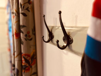 Coat pegs on a wall 
