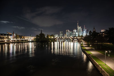 Illuminated buildings in city at night