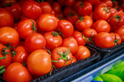 High angle view of tomatoes for sale at market stall