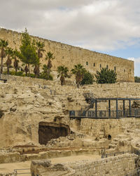 View of old ruin building against cloudy sky