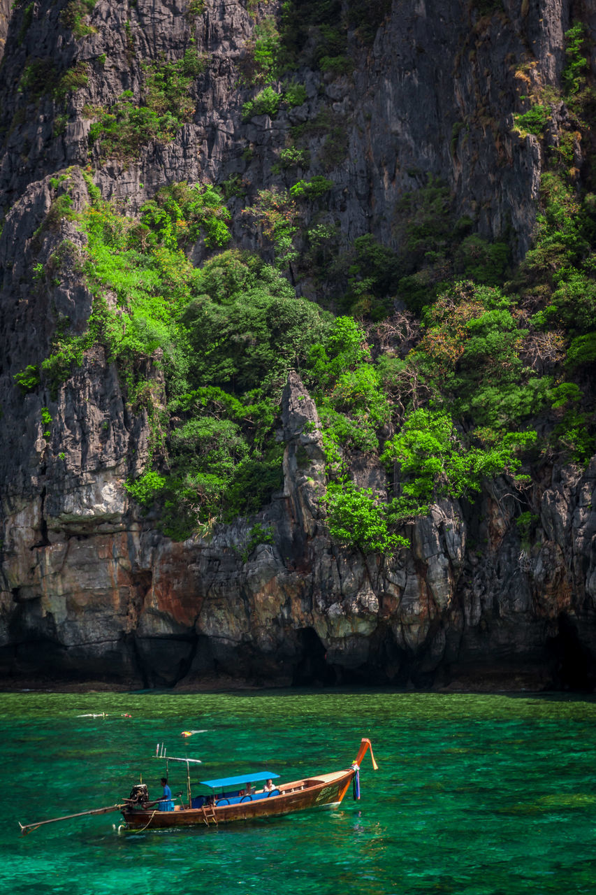 SCENIC VIEW OF ROCKS ON SEA