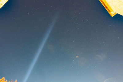Low angle view of star field against sky at night