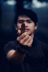 Close-up of man holding ice cream