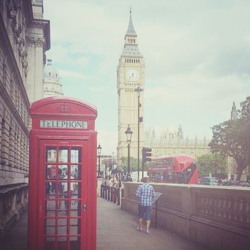 architecture, built structure, building exterior, tower, famous place, travel destinations, sky, international landmark, tourism, travel, city, capital cities, tall - high, men, incidental people, cloud - sky, person, clock tower, day