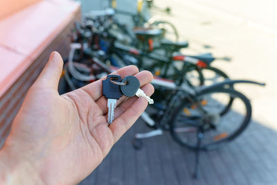 Close-up of hand holding key ring