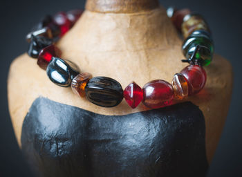 Close-up of necklace on mannequin