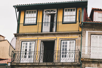 Low angle view of residential building against sky