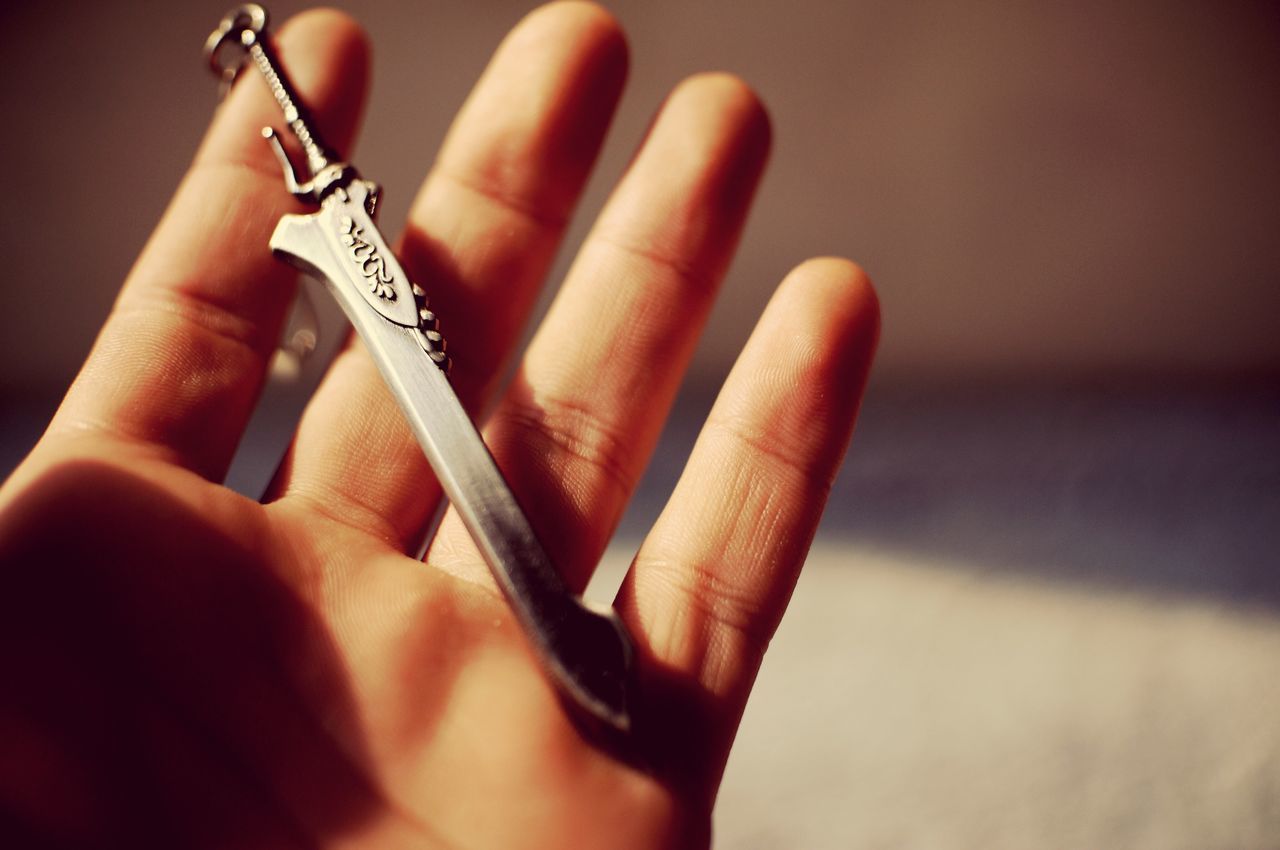 person, part of, human finger, cropped, indoors, holding, close-up, lifestyles, personal perspective, focus on foreground, human skin, unrecognizable person, ring, selective focus, nail polish, palm