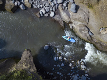 Man paddle boarding the river