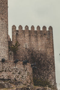 Low angle view of old building against sky