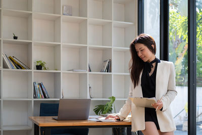 Beautiful businesswoman working in office