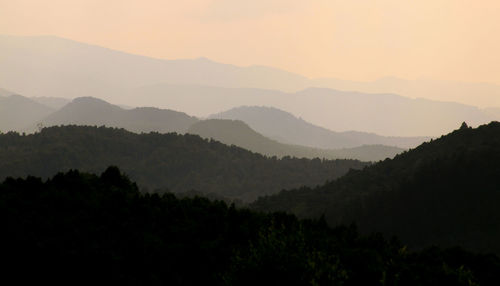 Scenic view of mountains against sky during sunset