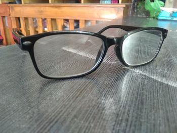 Close-up of sunglasses on table