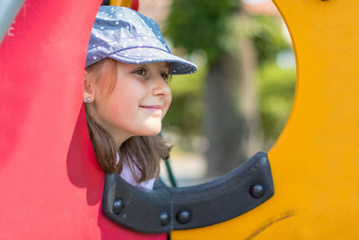 Portrait of smiling girl wearing hat